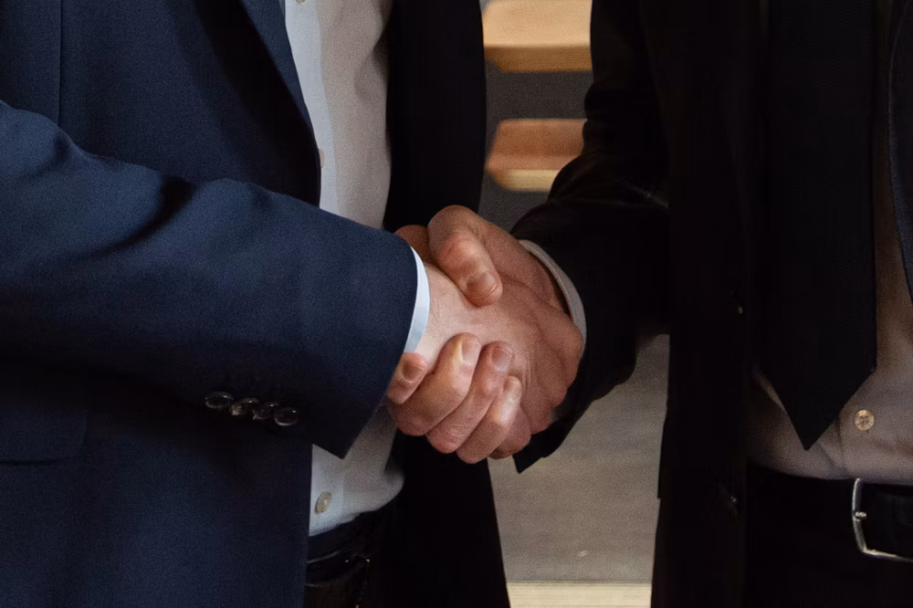 Business loan advisor reviewing funding options with a small business owner