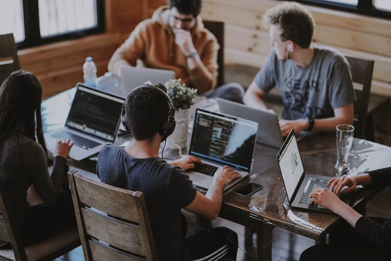 Business team planning long term growth backed by an SBA business loan